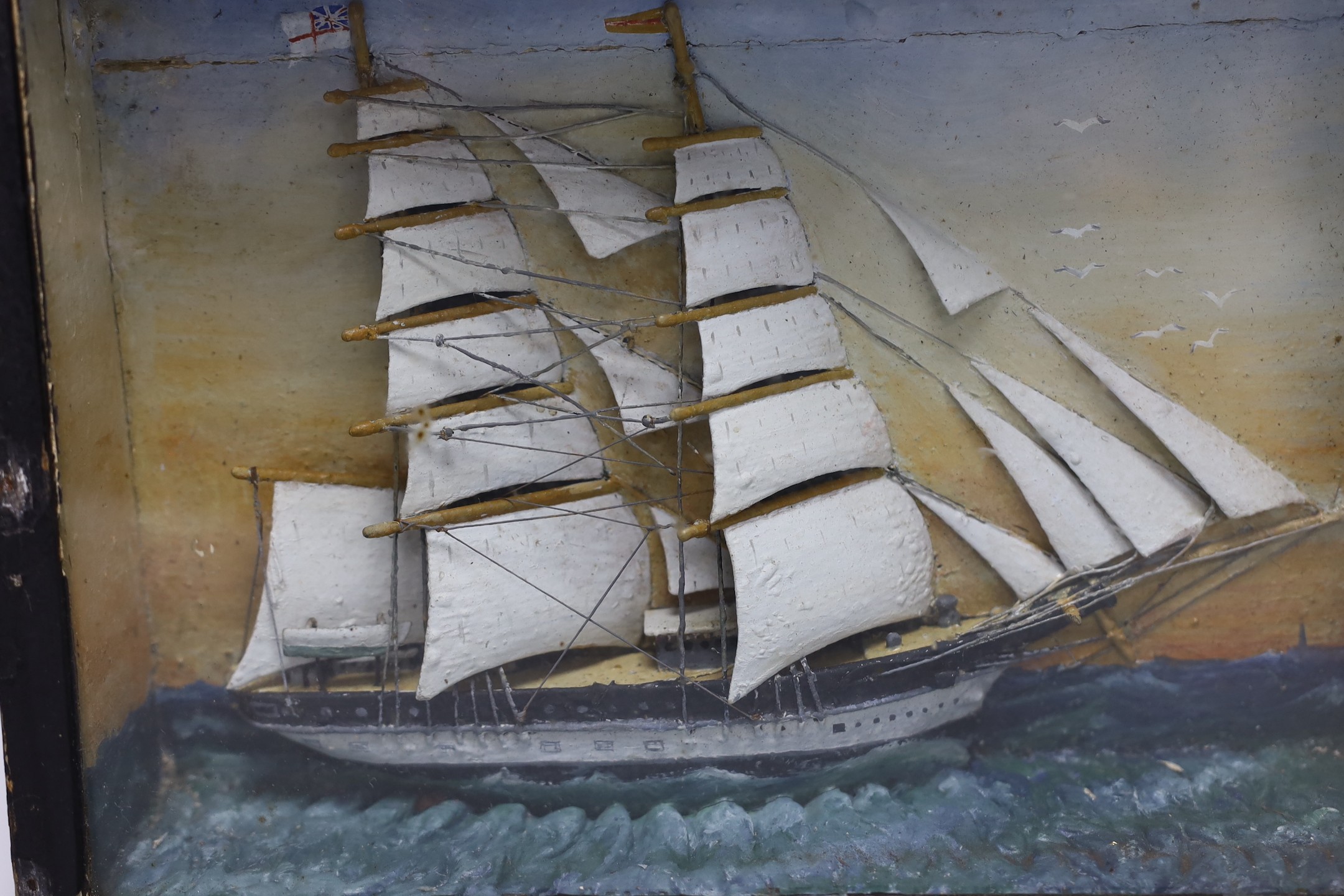 A painted half ship diorama, in glazed frame, 22x29cm
